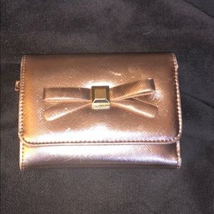 Rose gold wallet with bow